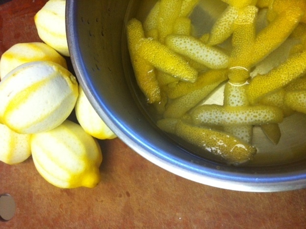Boiling lemon rinds for President Harding's lemon pineapple fruit punch, called a squall.