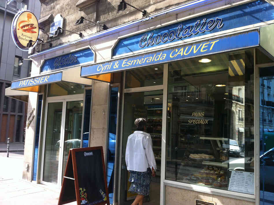A woman walks into Boulangerie Cauvet in Paris, where they still make croissants from scratch.