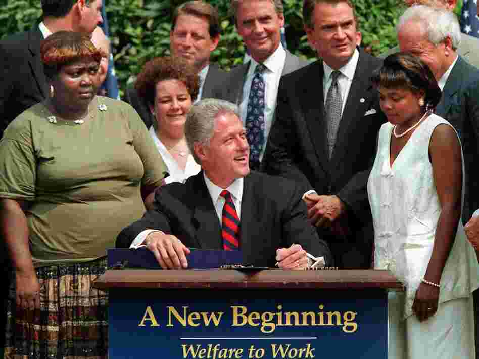 President Bill Clinton signs welfare reform legislation into law on Aug. 22, 1996.