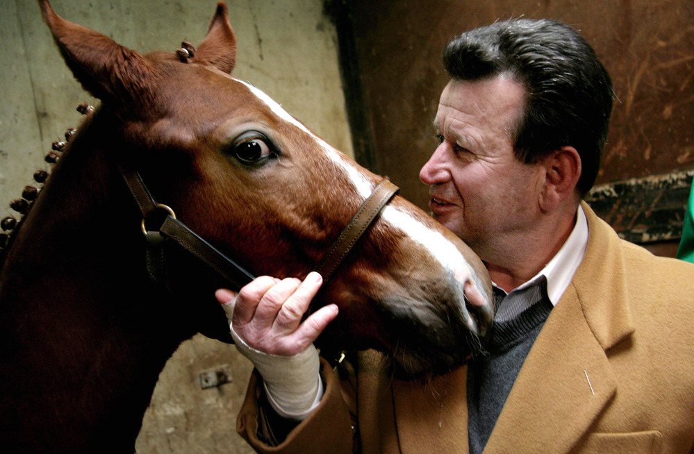 A cloned foal named "ET Cryozootech Stallion" stands with Hugo Simon, Austrian former Olympic rider of "princeps" (initial donor) ET. The main equestrian organization has ended its ban on clones in the Olympics