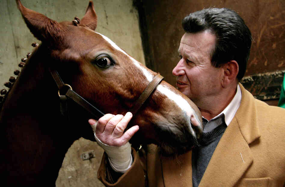 A cloned foal named "ET Cryozootech Stallion" stands with Hugo Simon, Austrian former Olympic rider of "princeps" (initial donor) ET. The main equestrian organization has ended its ban on clones in the Olympics