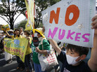 Anti-nuclear protesters carry "No nukes" banners during a march in Tokyo last month. Protests against Japan's use of nuclear power have grown in the aftermath of the March 2011 Fukushima disaster. Anti-nuclear protesters carry "No nukes" banners during a march in Tokyo last month. Protests against Japan's use of nuclear power have grown in the aftermath of the March 2011 Fukushima disaster.