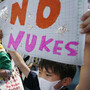 Anti-nuclear protesters carry "No nukes" banners during a march in Tokyo last month. Protests against Japan's use of nuclear power have grown in the aftermath of the March 2011 Fukushima disaster. Anti-nuclear protesters carry "No nukes" banners during a march in Tokyo last month. Protests against Japan's use of nuclear power have grown in the aftermath of the March 2011 Fukushima disaster.