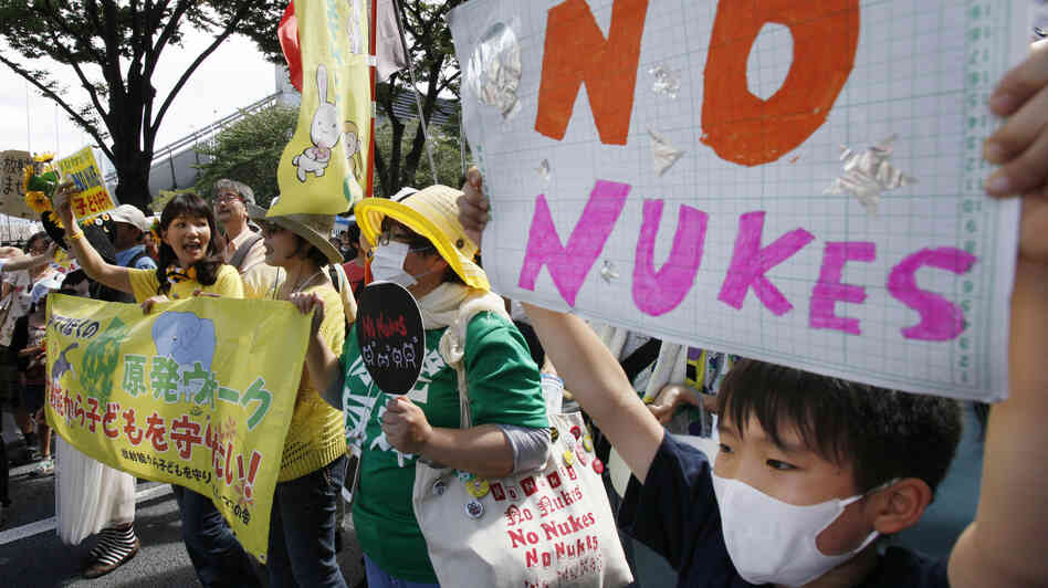 Anti-nuclear protesters carry "No nukes" banners during a march in Tokyo last month. Protests against Japan's use of nuclear power have grown in the aftermath of the March 2011 Fukushima disaster. Anti-nuclear protesters carry "No nukes" banners during a march in Tokyo last month. Protests against Japan's use of nuclear power have grown in the aftermath of the March 2011 Fukushima disaster.