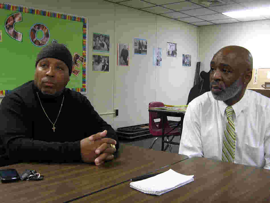 Rickie Knox (left) meets with Keith Young at New Haven's Head Start center. Knox comes here almost every day to be with his two grandchildren.