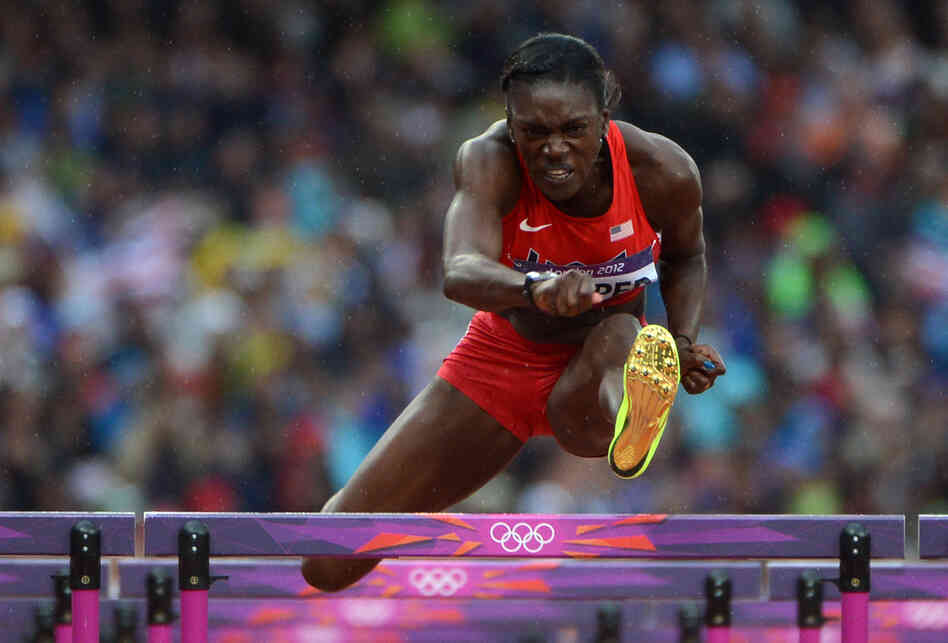 U.S. hurdler Dawn Harper competes in the women's 100-meter hurdles semifinals. She won a silver medal in the finals.