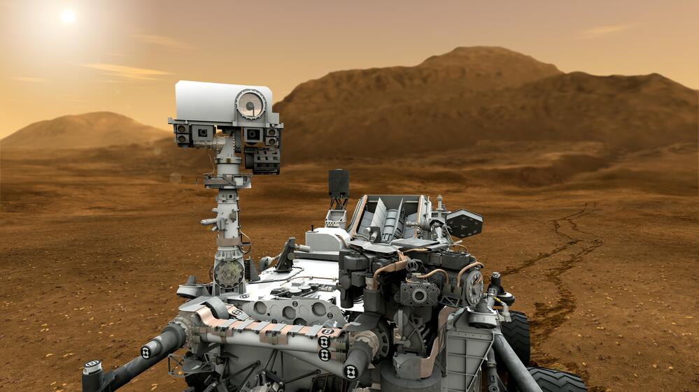This artist concept shows NASA's Curiosity rover as it will look once it starts investigating the Martian surface for the ability to sustain microbial life — past or present.