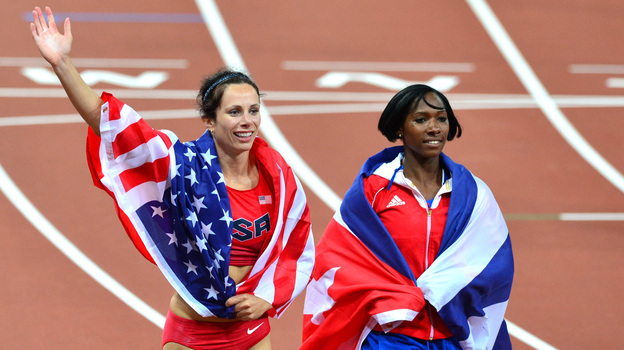 American gold medalist Jenn Suhr and Cuba's silver medalist Yarisley Silva celebrate after the women's pole vault final at the London 2012 Olympics. Suhr won silver at the 2008 Games.