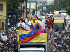 Venezuelan gold medal fencer Ruben Limardo (center) greets supporters after arriving in Caracas Monday. Limardo was received at the airport as a national hero, after winning the first gold medal for Venezuela in 44 years. Venezuelan gold medal fencer Ruben Limardo (center) greets supporters after arriving in Caracas Monday. Limardo was received at the airport as a national hero, after winning the first gold medal for Venezuela in 44 years.