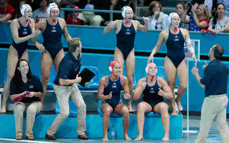 U.S. water polo players on the bench react during their semifinal match between Australia and the United States at the Water Polo Arena in London. The Americans will play for gold on Thursday.