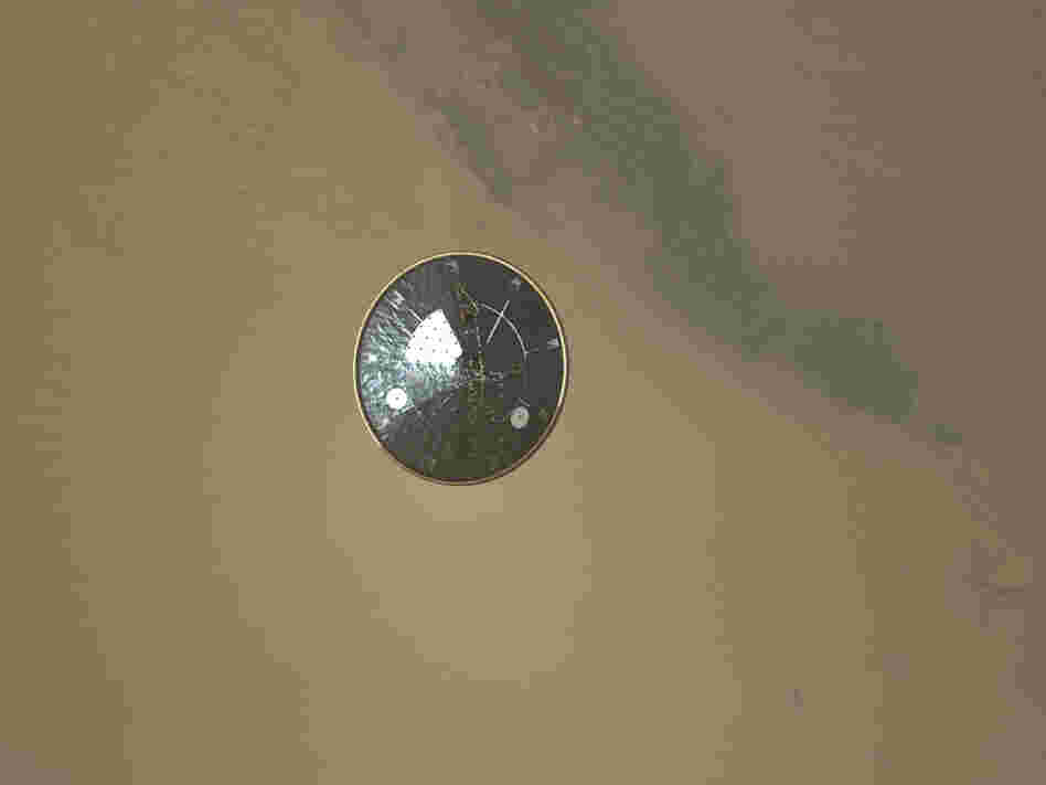 The heat shield as seen by a descending Mars Curiosity Rover.