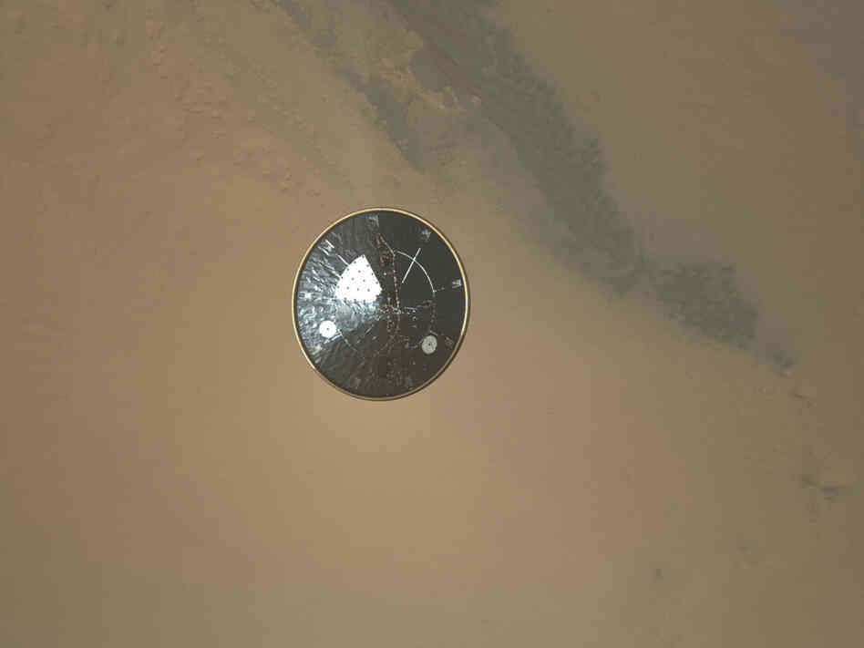 The heat shield as seen by a descending Mars Curiosity Rover.
