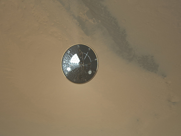 The heat shield as seen by a descending Mars Curiosity Rover.