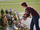 A visitor lays flowers on the Virginia Tech campus in Blacksburg, Va., on April 16, five years after a lone gunman killed 32 people. Many colleges formed threat assessment teams in the aftermath of the Virginia massacre. A visitor lays flowers on the Virginia Tech campus in Blacksburg, Va., on April 16, five years after a lone gunman killed 32 people. Many colleges formed threat assessment teams in the aftermath of the Virginia massacre.