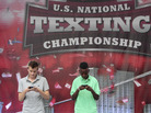 Austin Wierschke, left, of Rhinelander, Wis., and Kent Augustine, of Jamaica, N.Y., compete during the final round of the 2012 LG U.S. National Texting Championship on Wednesday, in New York. Wierschke won the championship for the second time in a row. Austin Wierschke, left, of Rhinelander, Wis., and Kent Augustine, of Jamaica, N.Y., compete during the final round of the 2012 LG U.S. National Texting Championship on Wednesday, in New York. Wierschke won the championship for the second time in a row.