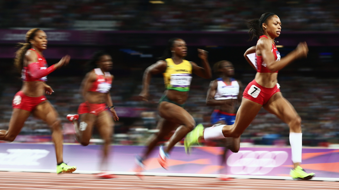 American sprinter Allyson Felix leads the field on her way to winning the women's 200 meters gold medal in London's Olympic Stadium.