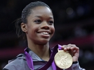 Gymnast Gabrielle Douglas, showing off her gold medal in the women's individual all-around competition last week. Gymnast Gabrielle Douglas, showing off her gold medal in the women's individual all-around competition last week.