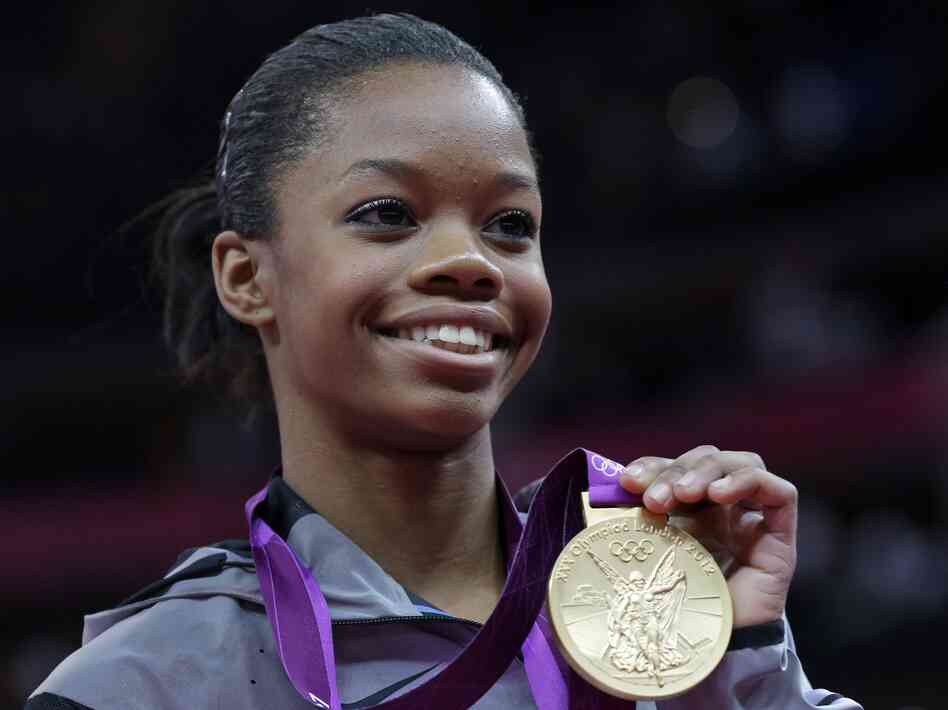 Gymnast Gabrielle Douglas, showing off her gold medal in the women's individual all-around competition last week. Gymnast Gabrielle Douglas, showing off her gold medal in the women's individual all-around competition last week.