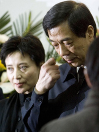 Gu Kailai and her husband, Bo Xilai, in 2007. Her trial involving the murder of a British businessman begins Thursday.