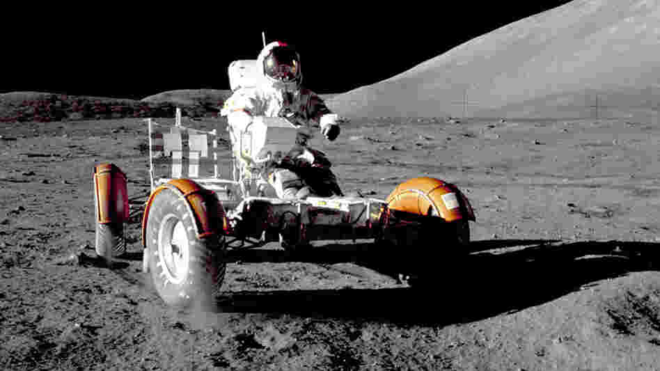 Apollo 17 commander Eugene A. Cernan takes a Lunar Roving Vehicle for a spin at the Taurus-Littrow landing site during the 1972 mission.