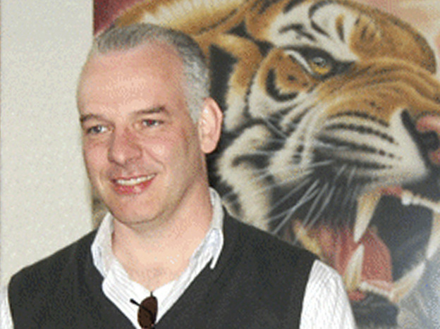 British businessman Neil Heywood, seen here at a gallery in Beijing last April, was found dead in his Chongqing hotel on Nov. 15, 2011. Heywood had ties to Bo Xilai's family, helping organize the education of son Bo Guagua, who studied at the exclusive British boarding schools Papplewick and Harrow.