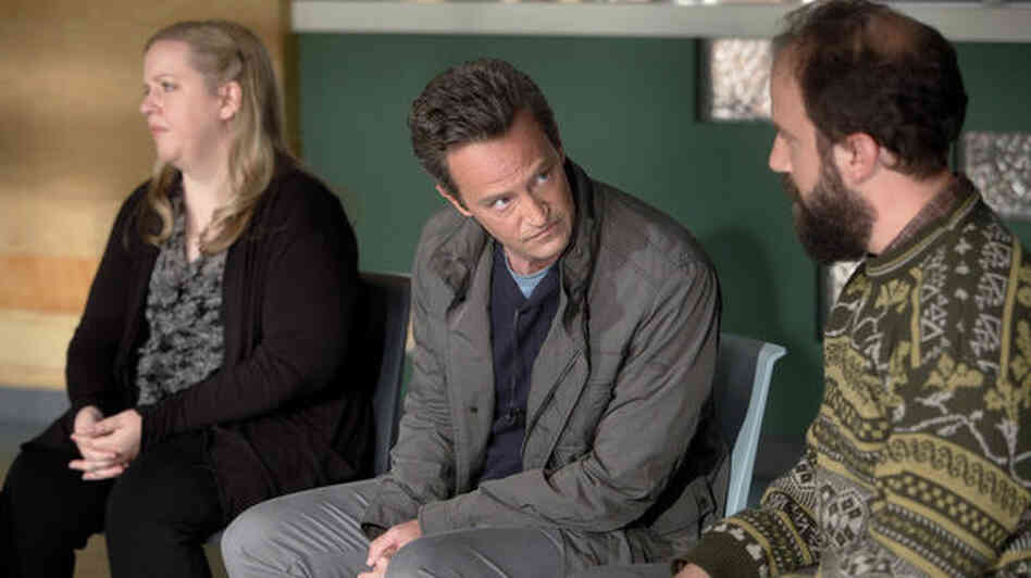 Sarah Baker as Sonia, Matthew Perry as Ryan King, and Brett Gelman as Mr. K in the new comedy Go On.