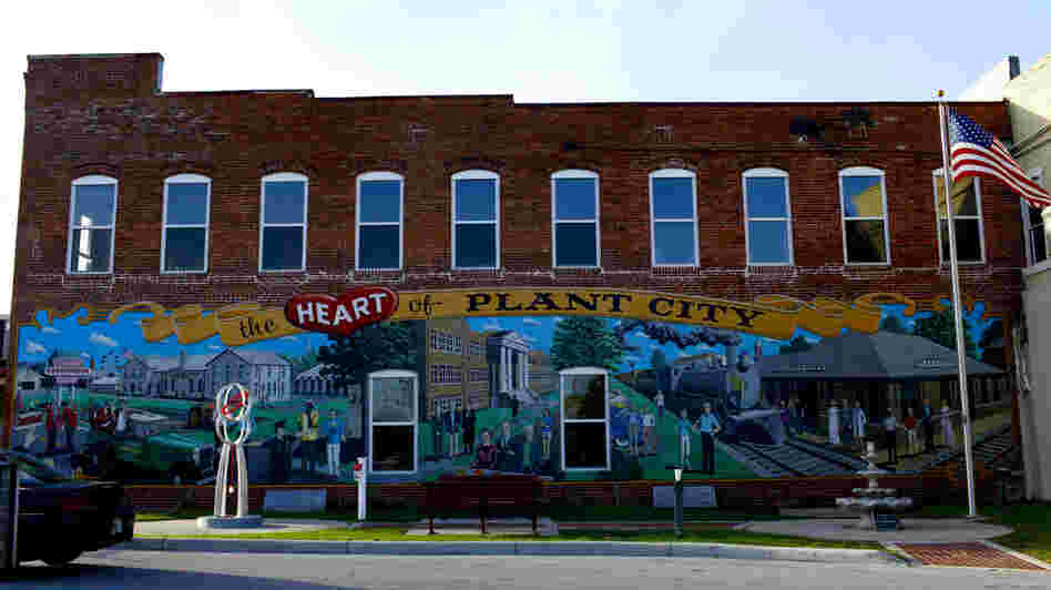 Plant City, Fla., claims to be the winter strawberry capital of the world. Here, a mural celebrating its past decorates the downtown.