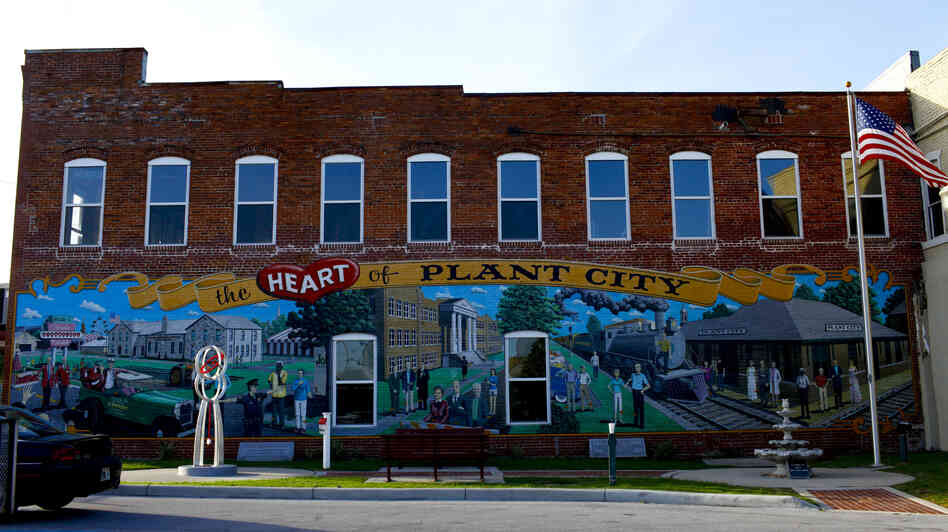 Plant City, Fla., claims to be the winter strawberry capital of the world. Here, a mural celebrating its past decorates the downtown.