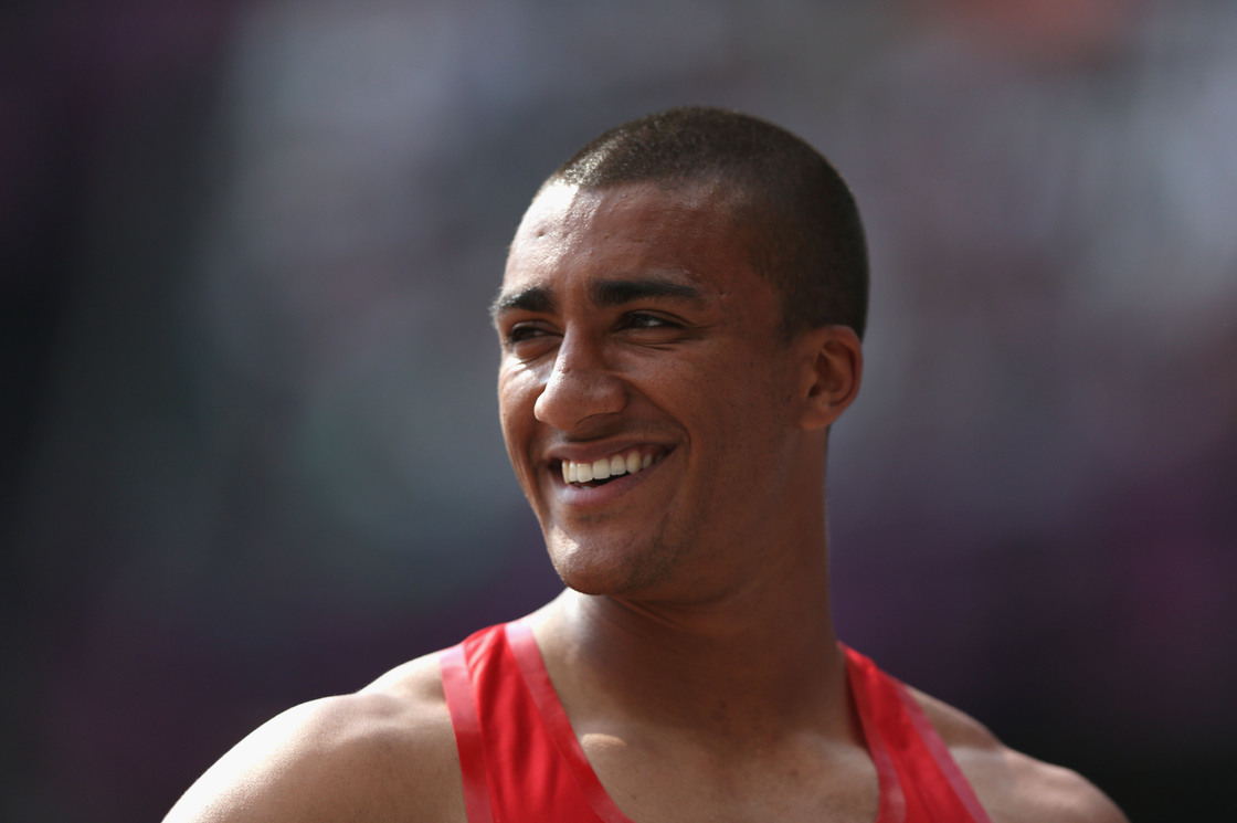 Ashton Eaton of the United States smiles after competing in the Men's Decathlon Pole Vault  in London.