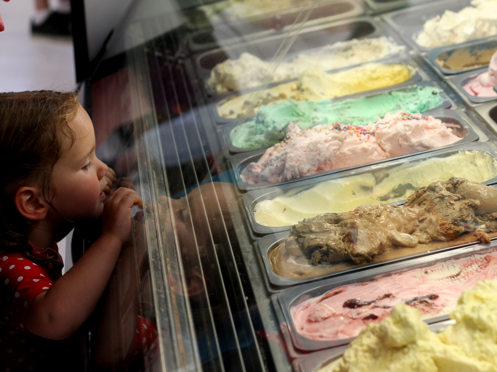 A girl checks out the options at Rocky Point Creamery in Tuscarora, Md., one of seven farms on the state's ice cream trail.