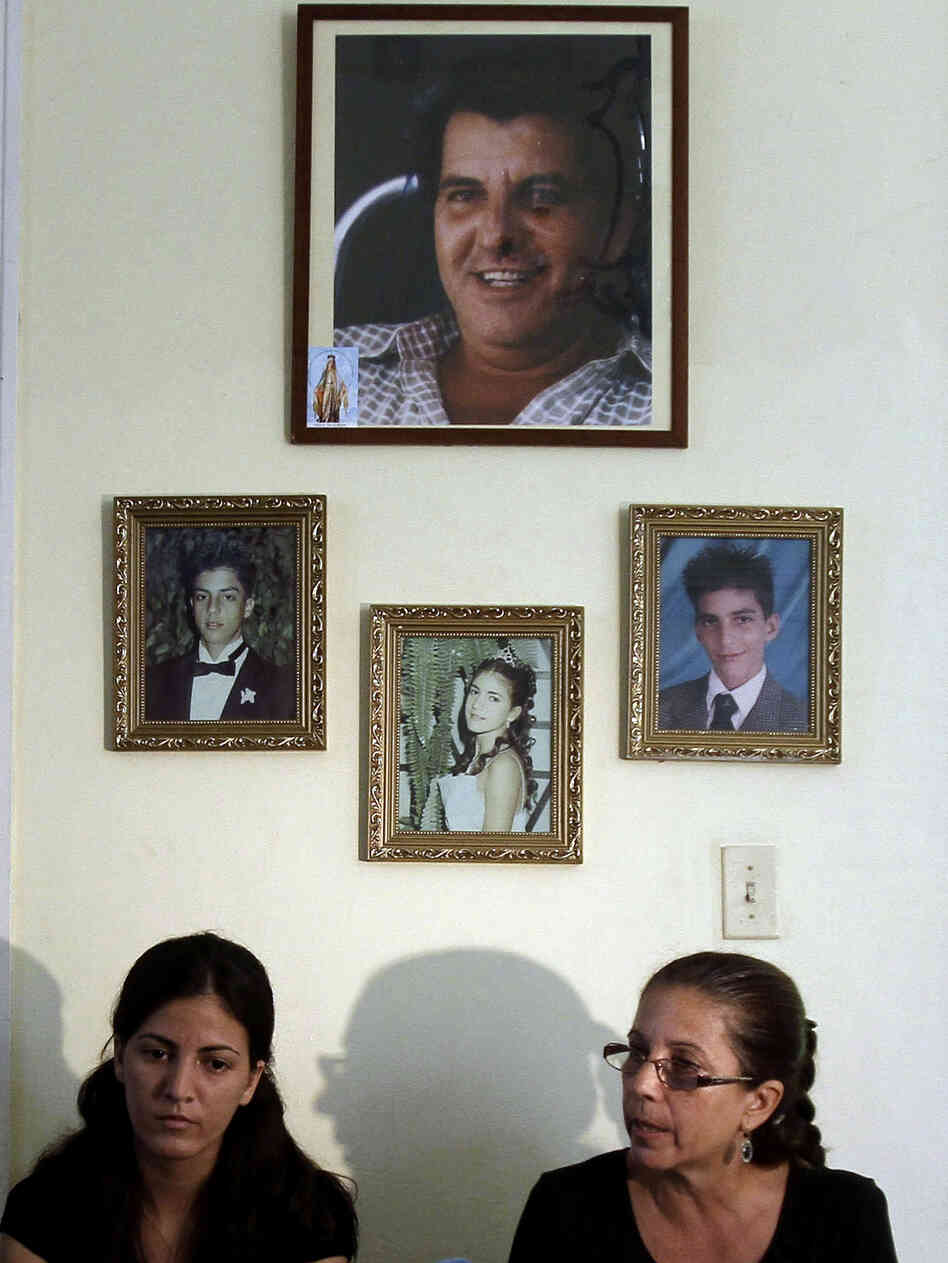 Ofelia Acevedo (right), the widow of Oswaldo Paya, and her daughter Rosa Maria Paya hold a news conference in Havana earlier this month. Acevedo says she doesn't believe her husband's death was an accident.