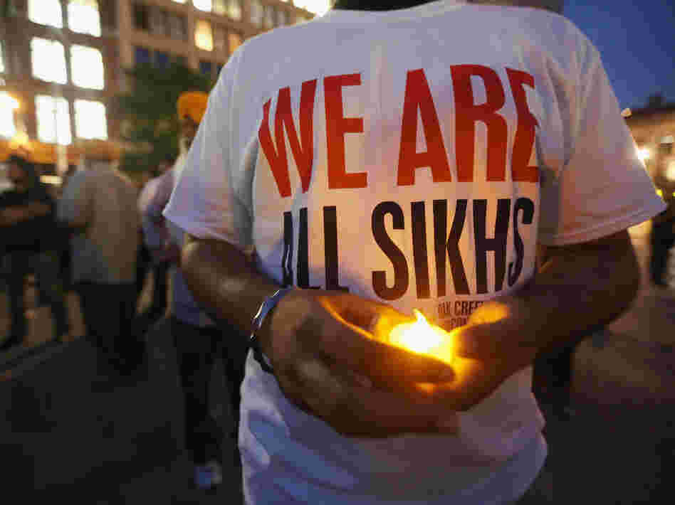 Sikhs and others who wanted to show support gathered Wednesday night for a vigil in Manhattan.