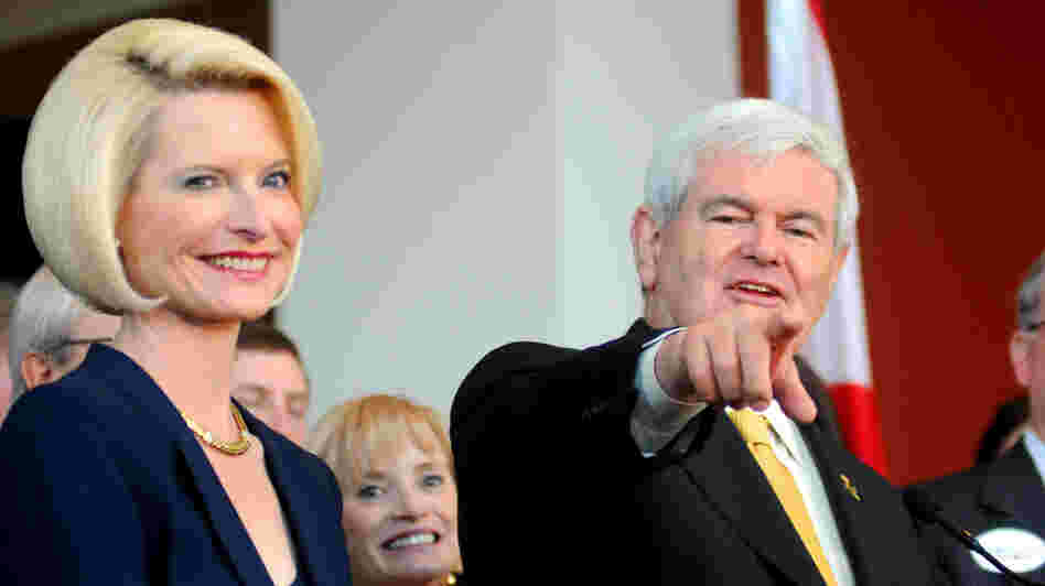 Former House Speaker Newt Gingrich, accompanied by his wife Callista, speaks at a rally in Montgomery, Ala., on March 7.