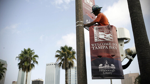 The Tampa Bay Host Committee for the Republican National Convention began installing banners on Wednesday.