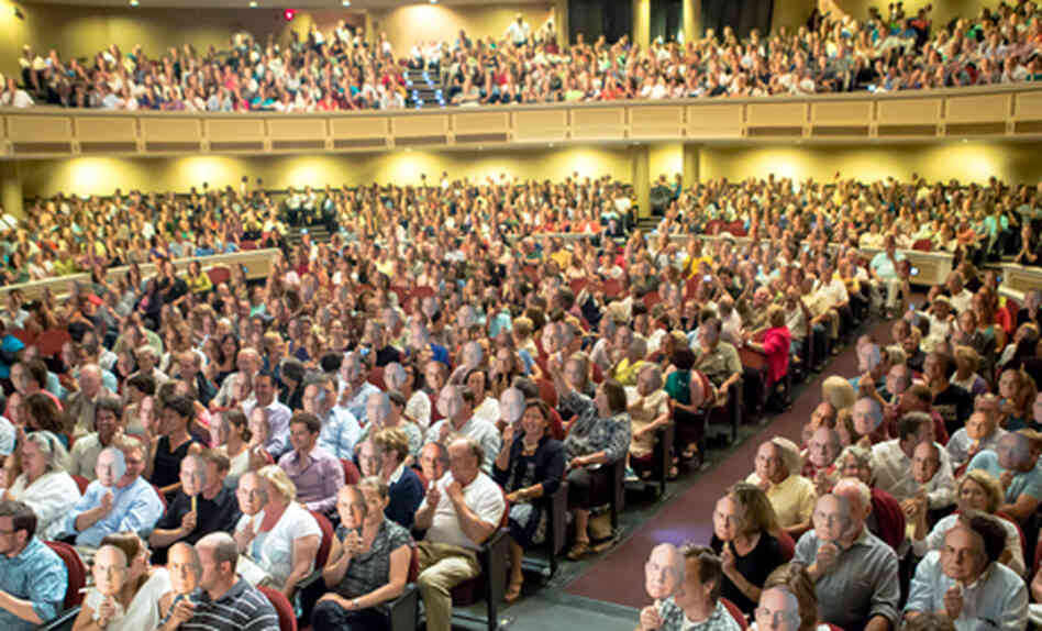 An auditorium full of his own face: the sold-out crowd offering a familiar welcome just as Carl came on stage. An auditorium full of his own face: the sold-out crowd offering a familiar welcome just as Carl came on stage.
