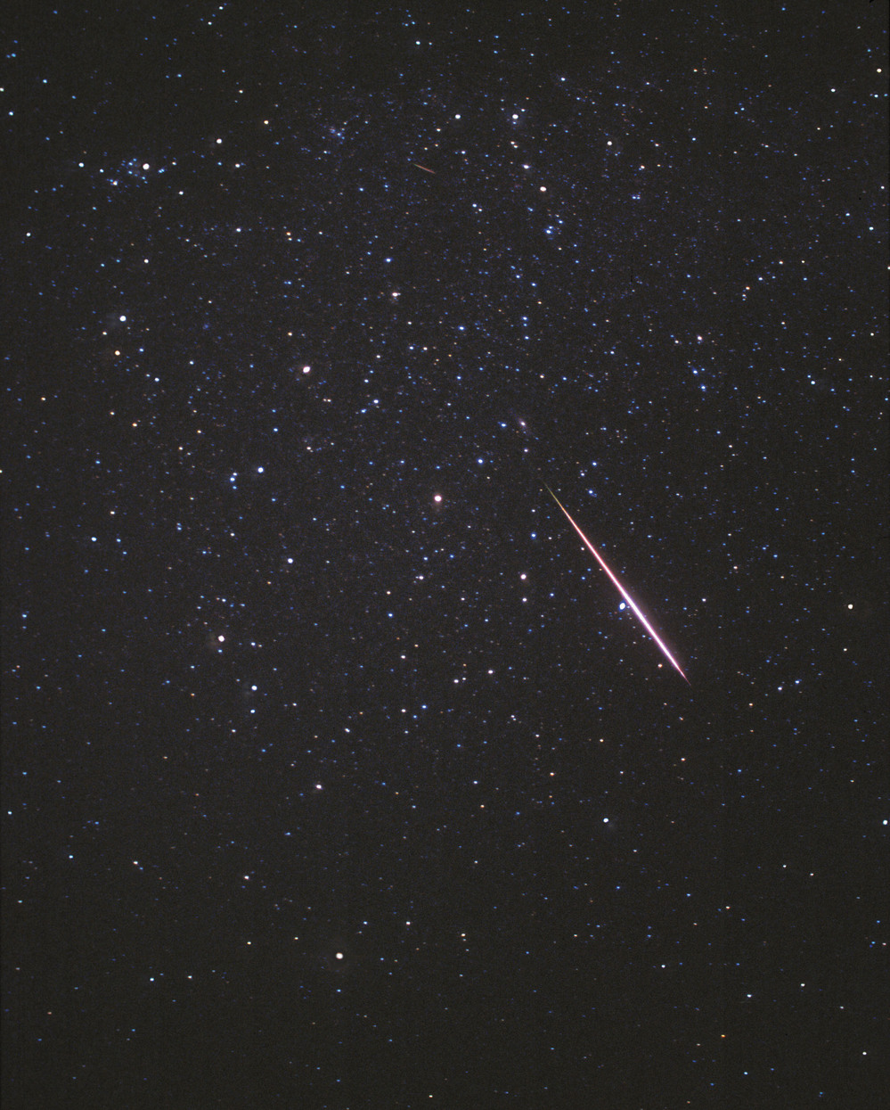 In this photo released by SkyandTelescope.com, a Perseid meteor flashes across the constellation Andromeda on Aug. 12, 1997.
