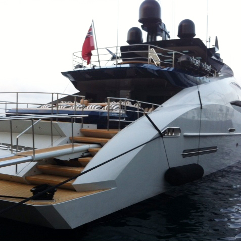 A foreign yacht is berthed at Porto Santo Stefano. Italian police have been raiding ports to check if yacht owners have been paying enough taxes.