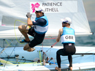 Great Britain's Stuart Bithell leaps off the boat while teammate Luke Patience sails on as they win silver in the men's sailing 470 two-person dinghy medal race in Weymouth, England. Great Britain's Stuart Bithell leaps off the boat while teammate Luke Patience sails on as they win silver in the men's sailing 470 two-person dinghy medal race in Weymouth, England.