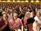 The audience at last night's taping of Wait Wait... Don't Tell Me! in Portland, Maine, holding up faces of Carl Kasell. The audience at last night's taping of Wait Wait... Don't Tell Me! in Portland, Maine, holding up faces of Carl Kasell.