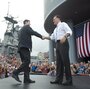 Rep. Paul Ryan of Wisconsin shakes hands with Mitt Romney as he's introduced as Romney's vice presidential running mate Saturday in Norfolk, Va. The USS Wisconsin is in the background. Rep. Paul Ryan of Wisconsin shakes hands with Mitt Romney as he's introduced as Romney's vice presidential running mate Saturday in Norfolk, Va. The USS Wisconsin is in the background.