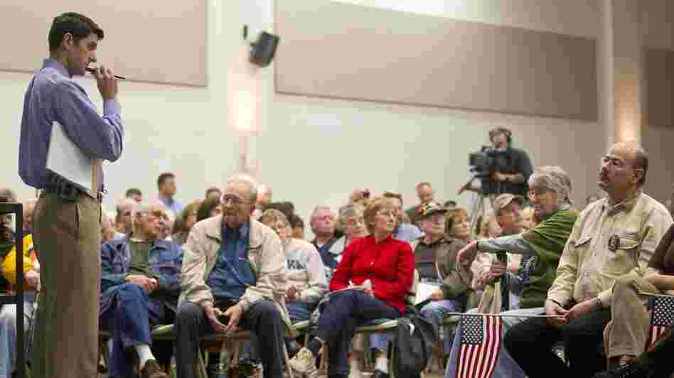 U.S. Rep. Paul Ryan, R-Wis. stands during a listening session in April 2011 in Kenosha, Wis. He is now presidential candidate Mitt Romney's running mate.