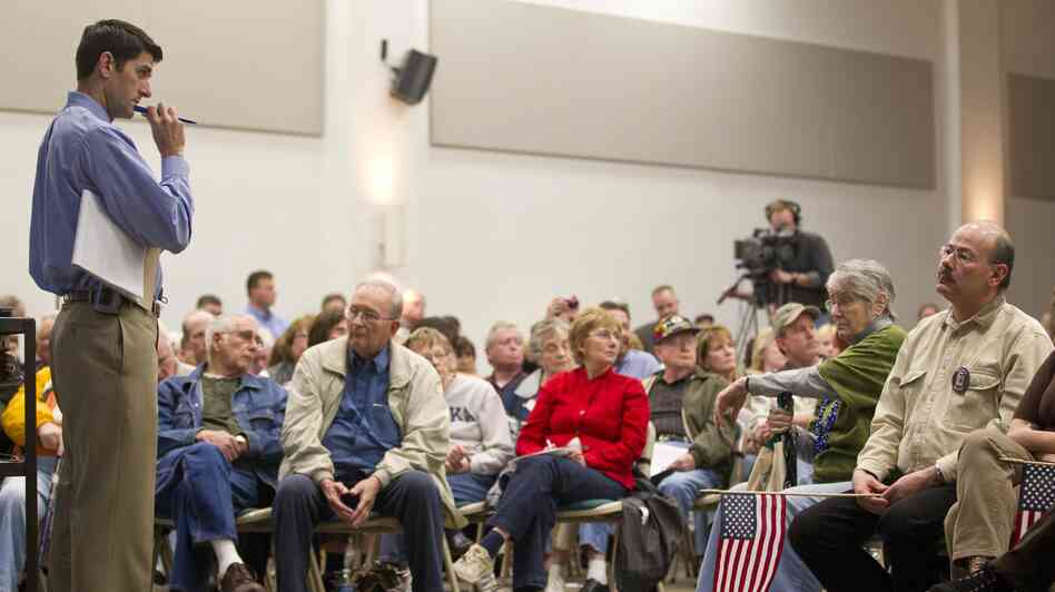 U.S. Rep. Paul Ryan, R-Wis. stands during a listening session in April 2011 in Kenosha, Wis. He is now presidential candidate Mitt Romney's running mate.