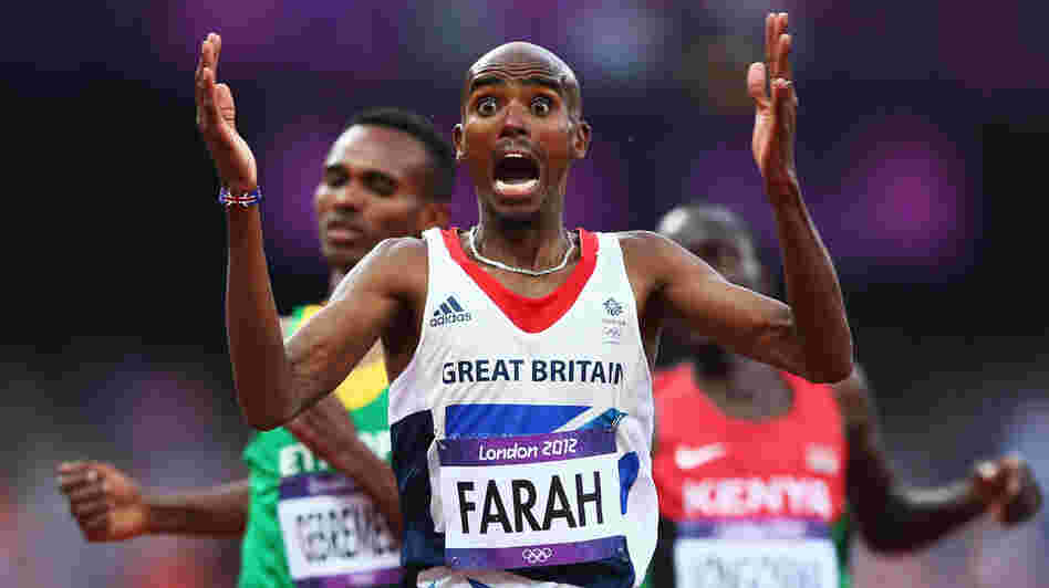 Mo Farah of Great Britain celebrates as he crosses the finish line to win gold ahead of Dejen Gebremeskel of Ethiopia and Thomas Pkemei Longosiwa of Kenya. Farah, who has become a celebrity in Britain, is the sixth man to win both the 5,000m and 10,000m distances at one Olympics.