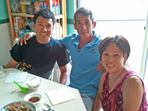 When his parents Tuy (center) and Mydung (right) Lam lost their jobs, electrical engineering major Louis Lam enlisted in the Navy.