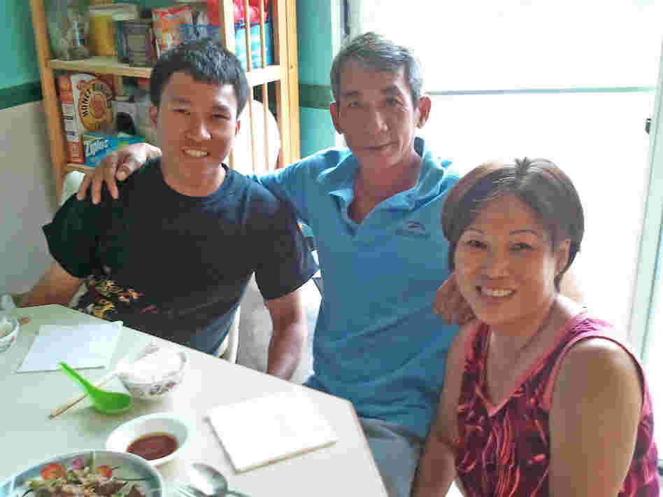 When his parents Tuy (center) and Mydung (right) Lam lost their jobs, electrical engineering major Louis Lam enlisted in the Navy.
