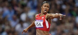 Carmelita Jeter of the U.S. points at the time board as she crosses the finish line to win the women's 4x100 meter relay at the Olympic Stadium on Day 14 of the London 2012 Olympic Games. The U.S. set a new world record by finishing the race in 40.82 seconds. Carmelita Jeter of the U.S. points at the time board as she crosses the finish line to win the women's 4x100 meter relay at the Olympic Stadium on Day 14 of the London 2012 Olympic Games. The U.S. set a new world record by finishing the race in 40.82 seconds.