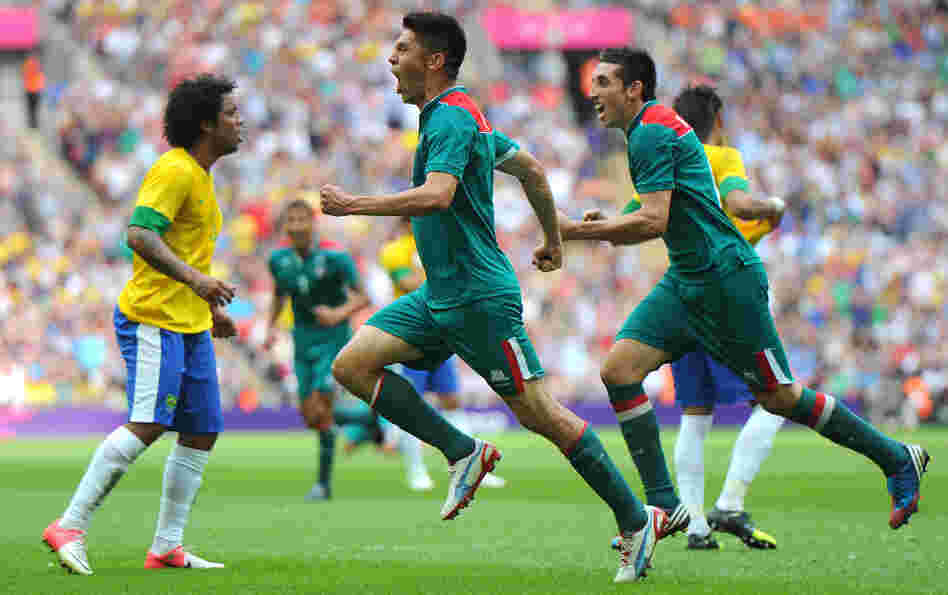 Oribe Peralta of Mexico celebrates scoring his second goal as Mexico beat Brazil, 2-1, to win Olympic gold medal in London's Wembley Stadium.