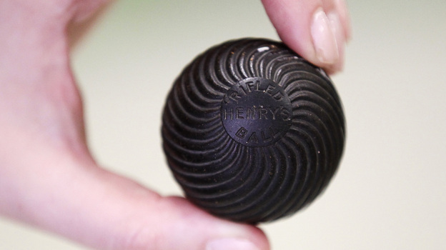 A 1903 rubber core golf ball, on display at Christie's auction house in London.