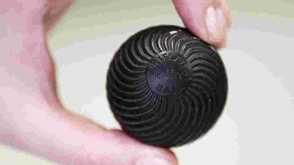 A 1903 rubber core golf ball, on display at Christie's auction house in London.