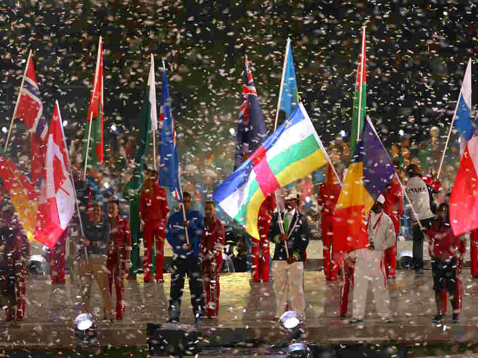 Athletes enter the stadium during the Closing Ceremony.